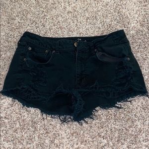 black distressed american eagle shorts